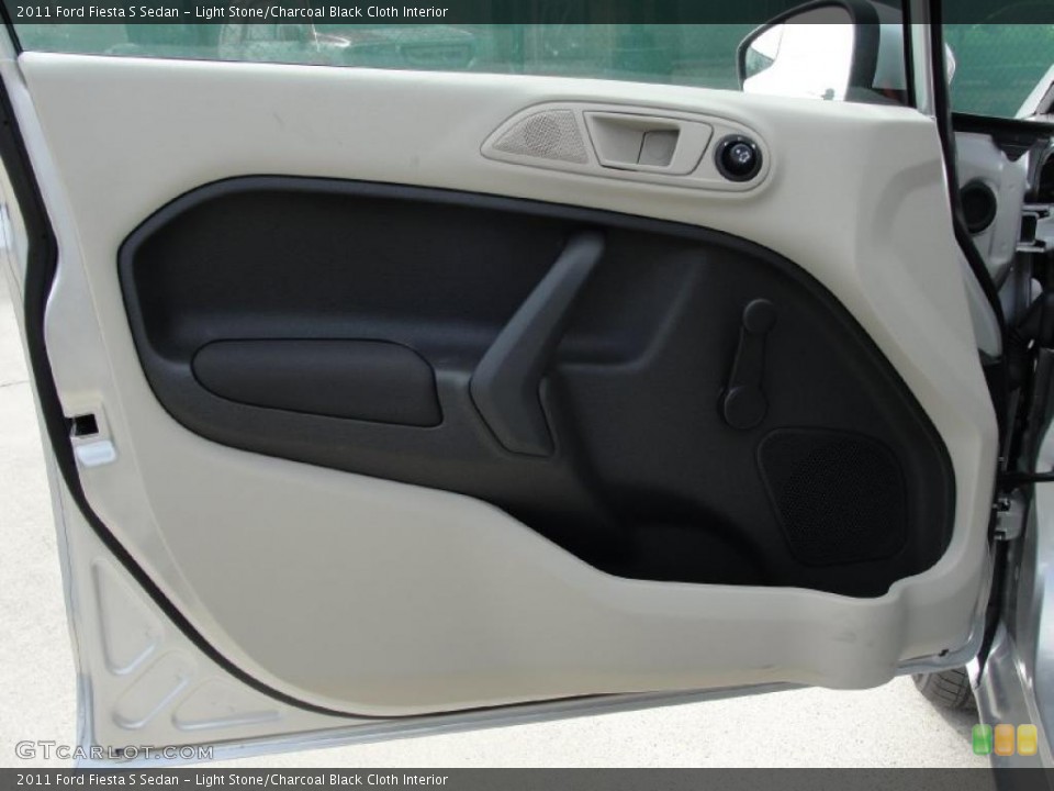 Light Stone/Charcoal Black Cloth Interior Door Panel for the 2011 Ford Fiesta S Sedan #40542297