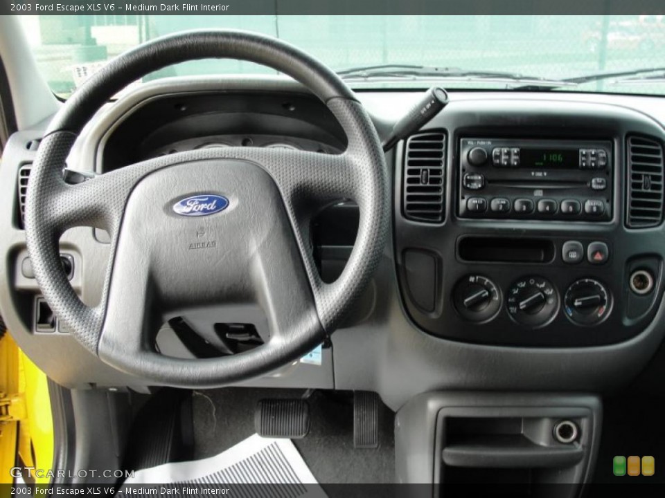 Medium Dark Flint Interior Dashboard for the 2003 Ford Escape XLS V6 #40543629