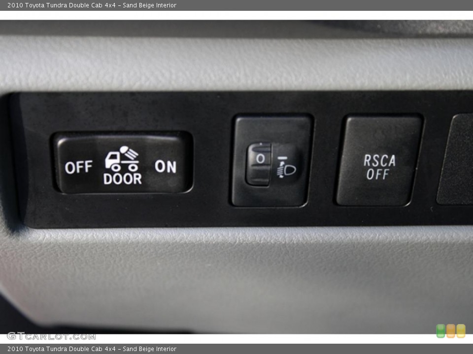 Sand Beige Interior Controls for the 2010 Toyota Tundra Double Cab 4x4 #40579709