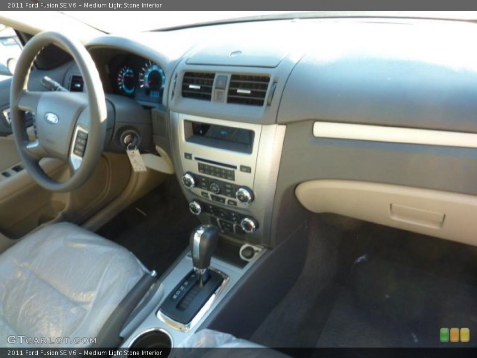 Medium Light Stone Interior Dashboard for the 2011 Ford Fusion SE V6 #40590877