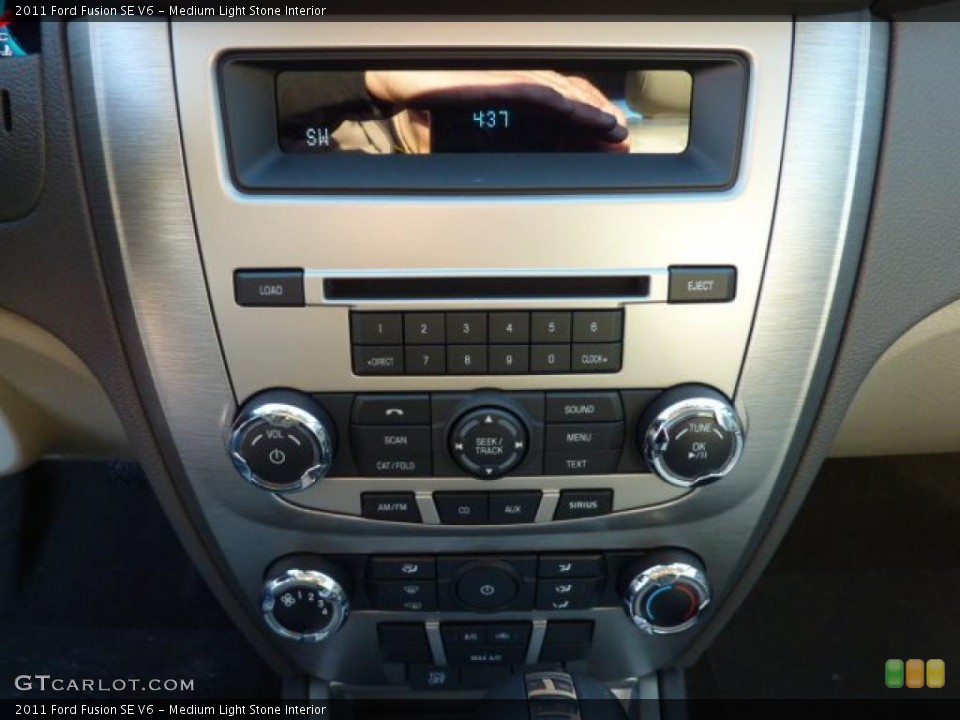 Medium Light Stone Interior Controls for the 2011 Ford Fusion SE V6 #40590909