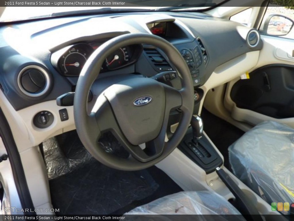 Light Stone/Charcoal Black Cloth Interior Prime Interior for the 2011 Ford Fiesta S Sedan #40594949