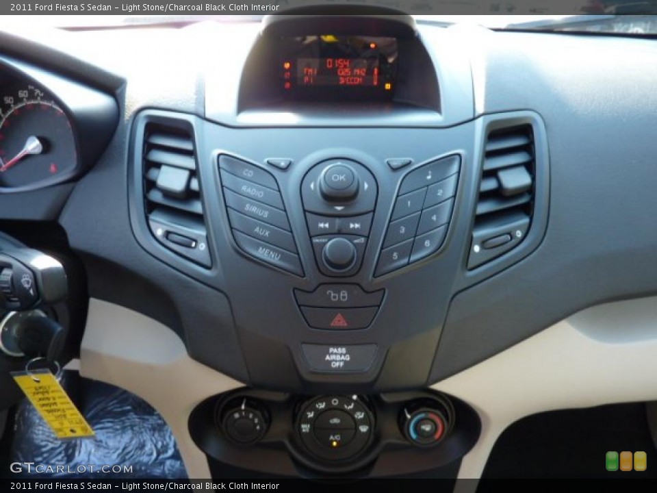 Light Stone/Charcoal Black Cloth Interior Controls for the 2011 Ford Fiesta S Sedan #40595053