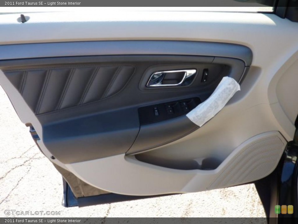Light Stone Interior Door Panel for the 2011 Ford Taurus SE #40596185
