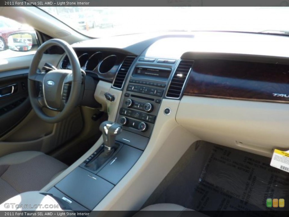 Light Stone Interior Dashboard for the 2011 Ford Taurus SEL AWD #40597449
