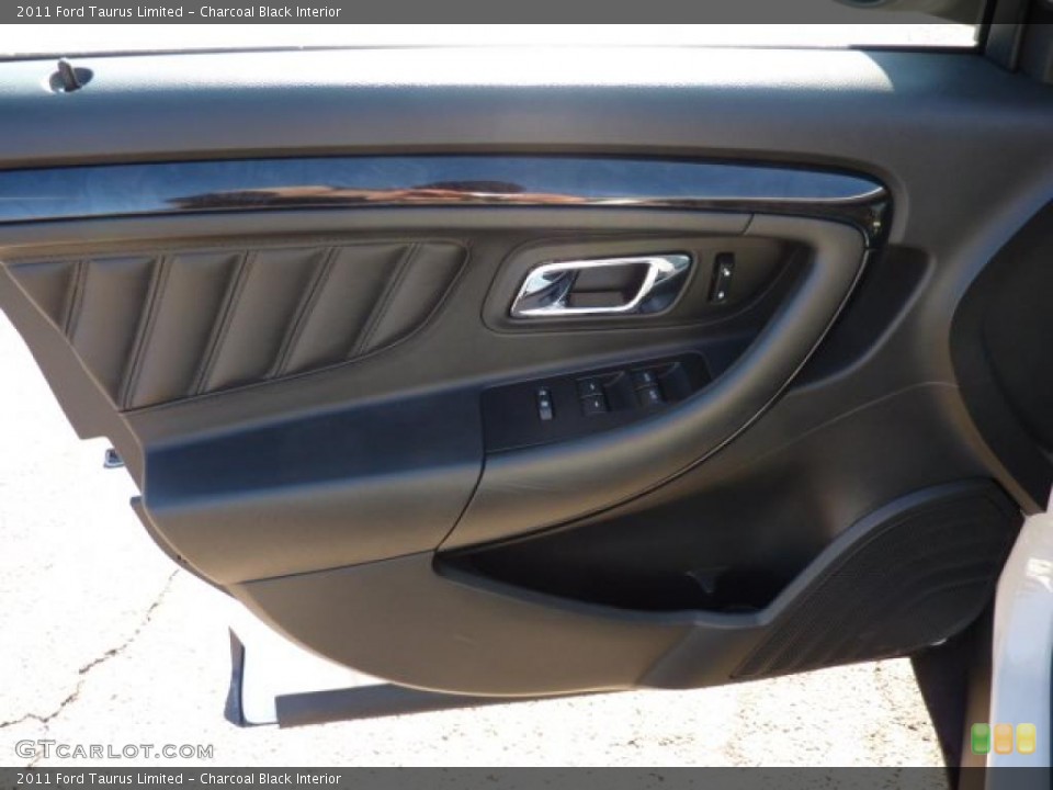 Charcoal Black Interior Door Panel for the 2011 Ford Taurus Limited #40597701