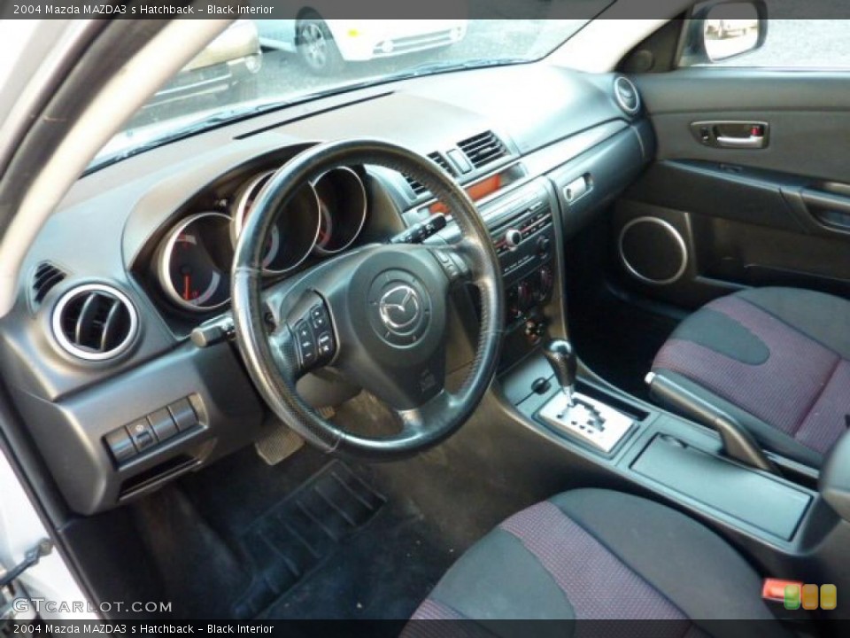 Black Interior Prime Interior for the 2004 Mazda MAZDA3 s Hatchback #40617482