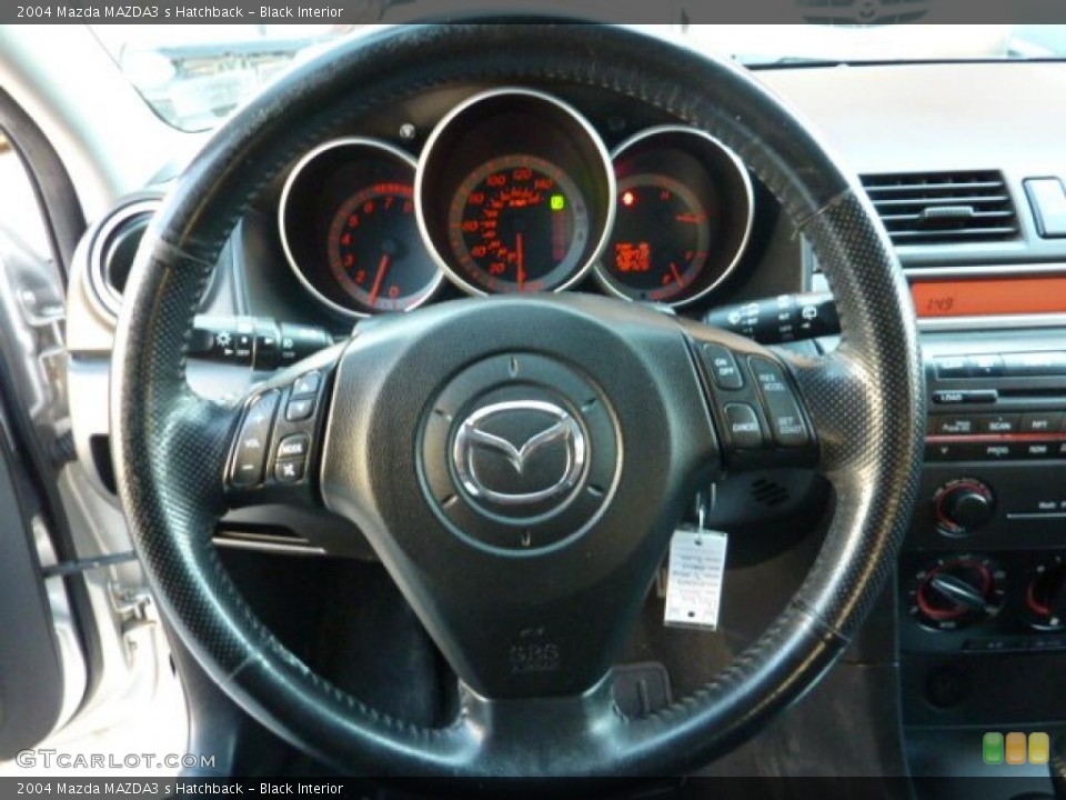 Black Interior Steering Wheel for the 2004 Mazda MAZDA3 s Hatchback #40617502