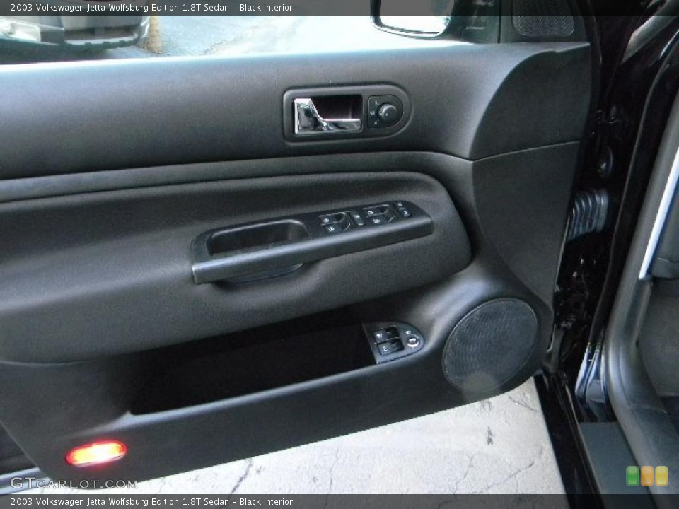 Black Interior Door Panel for the 2003 Volkswagen Jetta Wolfsburg Edition 1.8T Sedan #40618398
