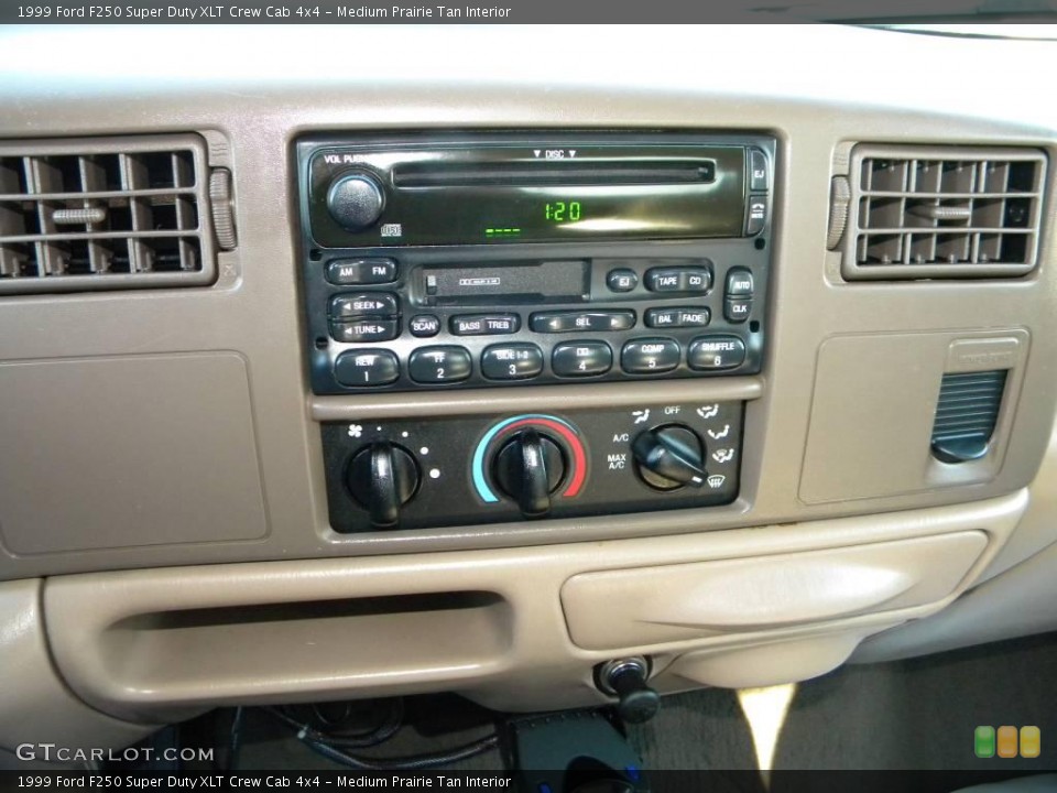 Medium Prairie Tan Interior Controls for the 1999 Ford F250 Super Duty XLT Crew Cab 4x4 #40646226