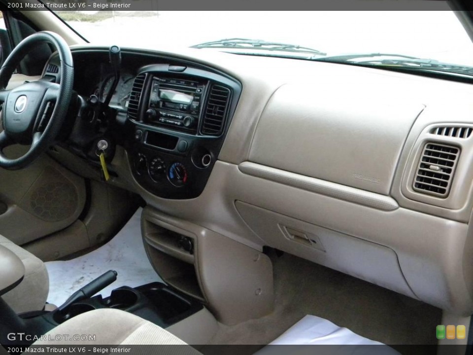 Beige Interior Dashboard for the 2001 Mazda Tribute LX V6 #40659861