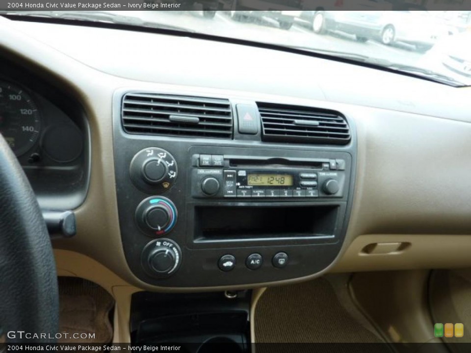 Ivory Beige Interior Controls for the 2004 Honda Civic Value Package Sedan #40666003