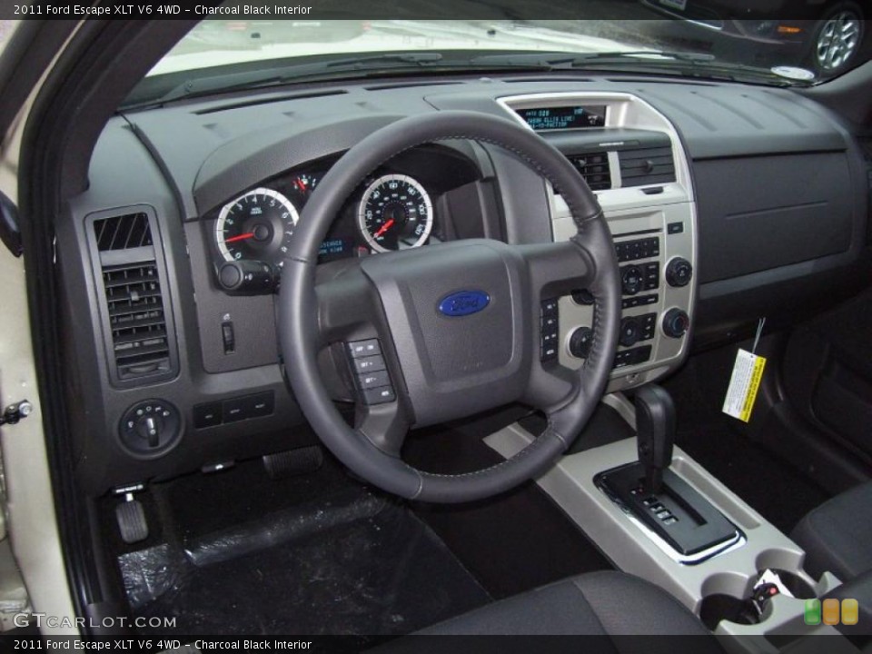 Charcoal Black Interior Dashboard for the 2011 Ford Escape XLT V6 4WD #40688974