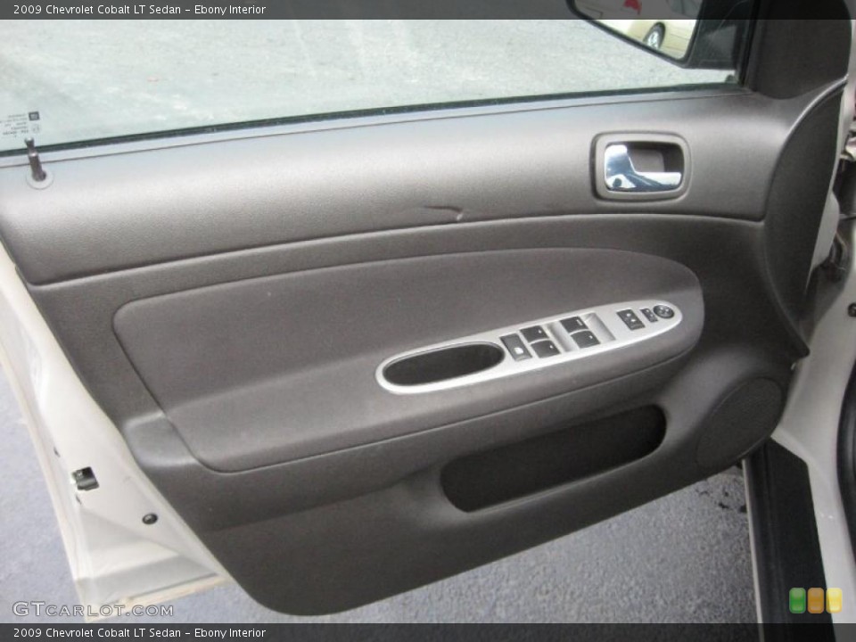 Ebony Interior Door Panel for the 2009 Chevrolet Cobalt LT Sedan #40703521