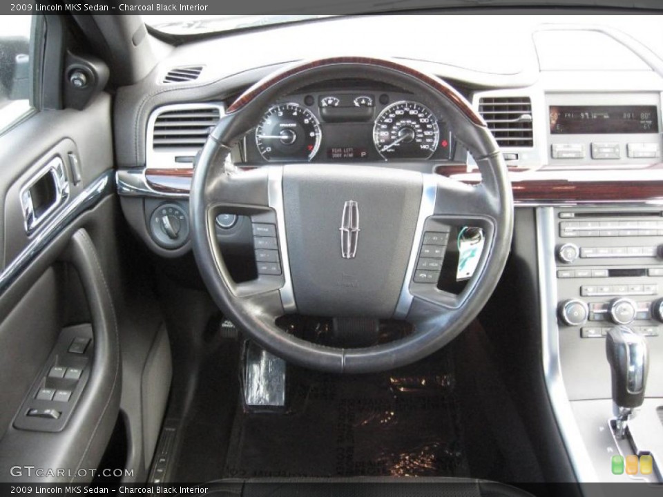 Charcoal Black Interior Steering Wheel for the 2009 Lincoln MKS Sedan #40704225