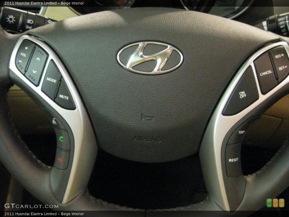 Beige Interior Controls for the 2011 Hyundai Elantra Limited #40707641