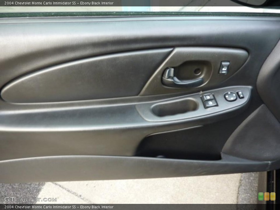 Ebony Black Interior Door Panel for the 2004 Chevrolet Monte Carlo Intimidator SS #40718374