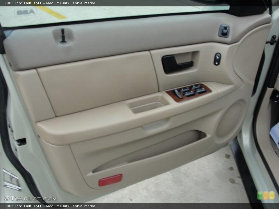 Medium/Dark Pebble Interior Door Panel for the 2005 Ford Taurus SEL #40718814