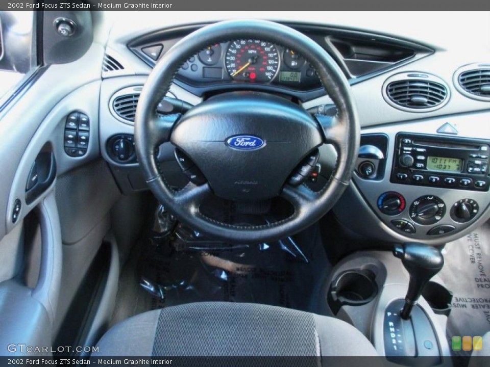Medium Graphite Interior Dashboard for the 2002 Ford Focus ZTS Sedan #40737827