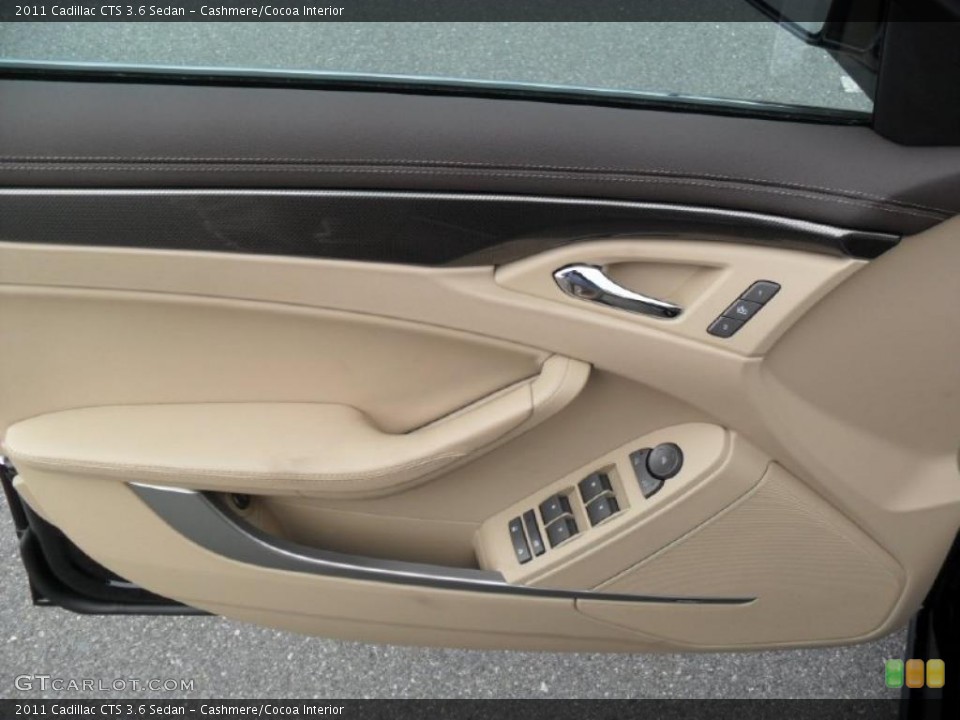 Cashmere/Cocoa Interior Door Panel for the 2011 Cadillac CTS 3.6 Sedan #40764387