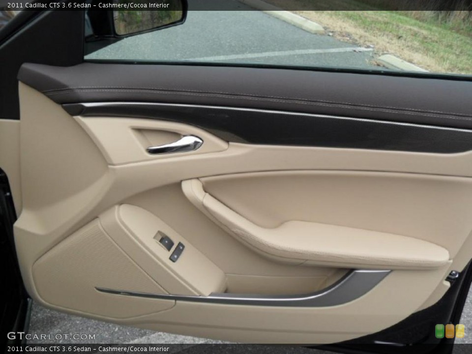 Cashmere/Cocoa Interior Door Panel for the 2011 Cadillac CTS 3.6 Sedan #40764591