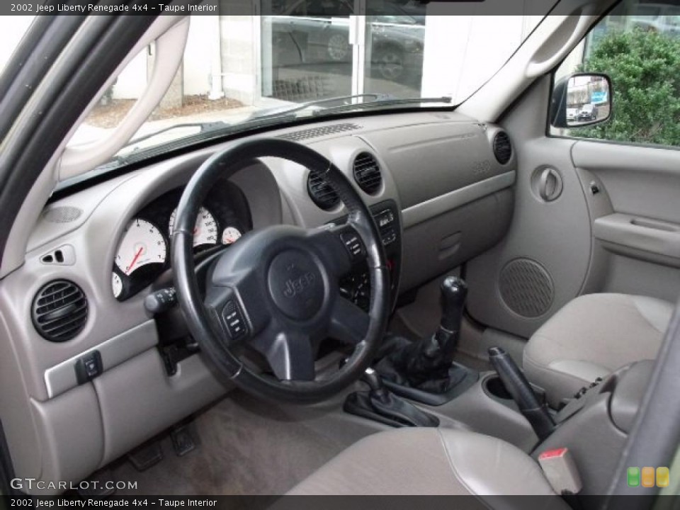 Taupe Interior Prime Interior for the 2002 Jeep Liberty Renegade 4x4 #40780403