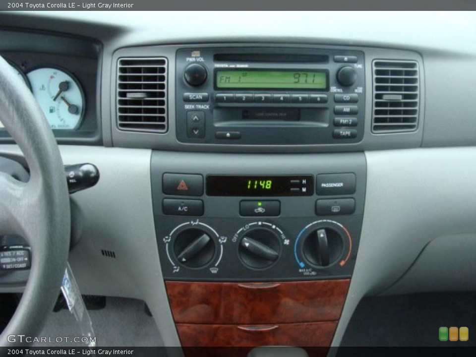 Light Gray Interior Controls for the 2004 Toyota Corolla LE #40802599