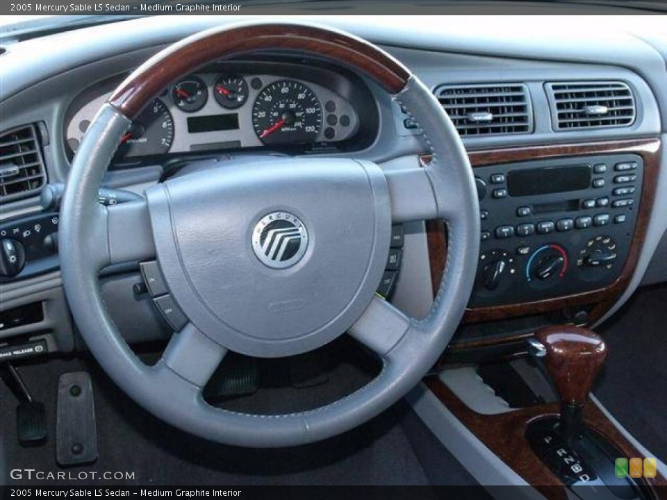 Medium Graphite Interior Controls for the 2005 Mercury Sable LS Sedan #40844697