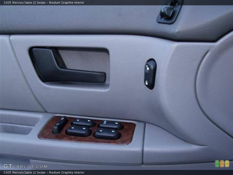 Medium Graphite Interior Controls for the 2005 Mercury Sable LS Sedan #40844721