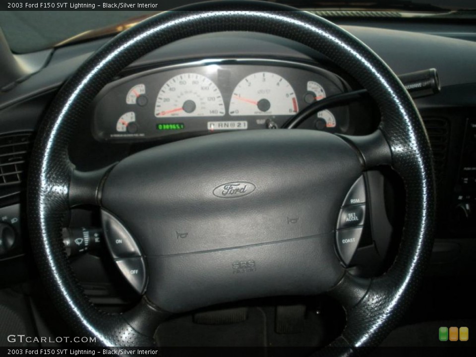 Black/Silver Interior Steering Wheel for the 2003 Ford F150 SVT Lightning #40869950