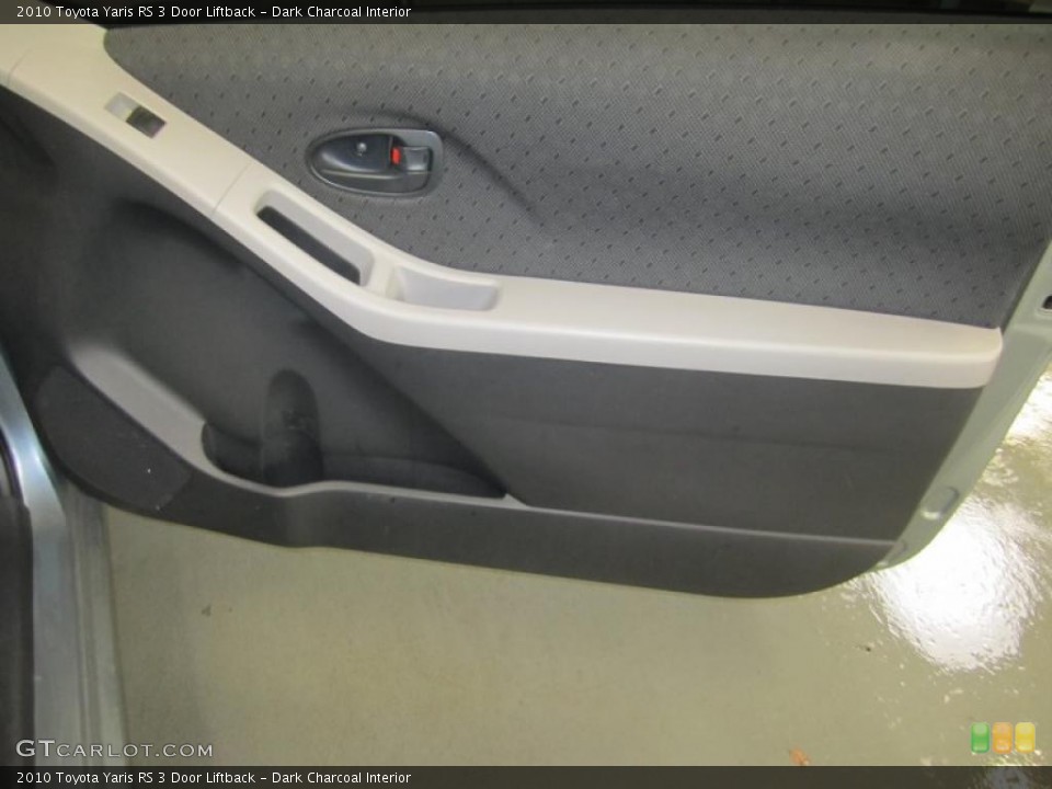 Dark Charcoal Interior Door Panel for the 2010 Toyota Yaris RS 3 Door Liftback #40884537
