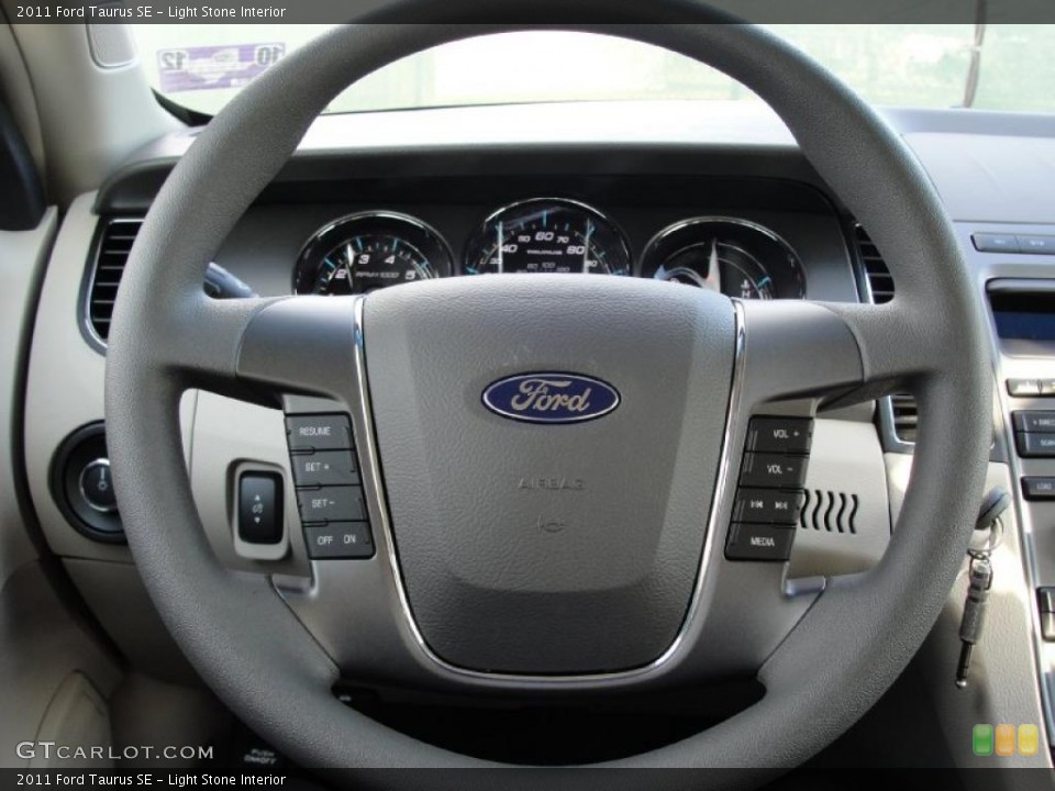 Light Stone Interior Steering Wheel for the 2011 Ford Taurus SE #40926710