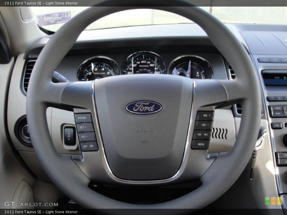 Light Stone Interior Steering Wheel for the 2011 Ford Taurus SE #40927261