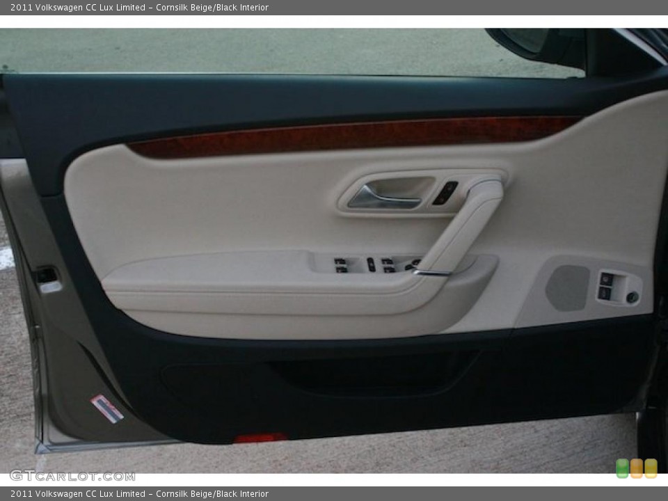 Cornsilk Beige/Black Interior Door Panel for the 2011 Volkswagen CC Lux Limited #40937882