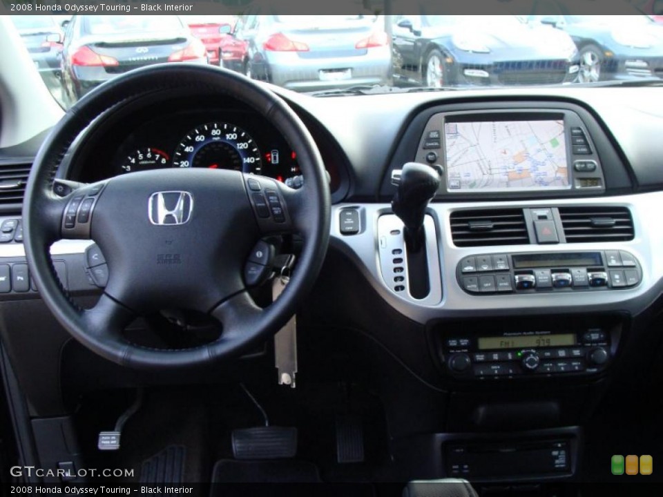 Black Interior Dashboard for the 2008 Honda Odyssey Touring #41008754