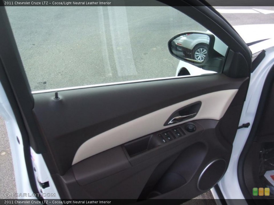 Cocoa/Light Neutral Leather Interior Door Panel for the 2011 Chevrolet Cruze LTZ #41015759