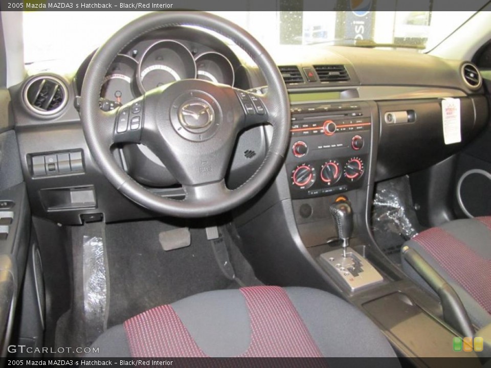 Black/Red Interior Photo for the 2005 Mazda MAZDA3 s Hatchback #41026088