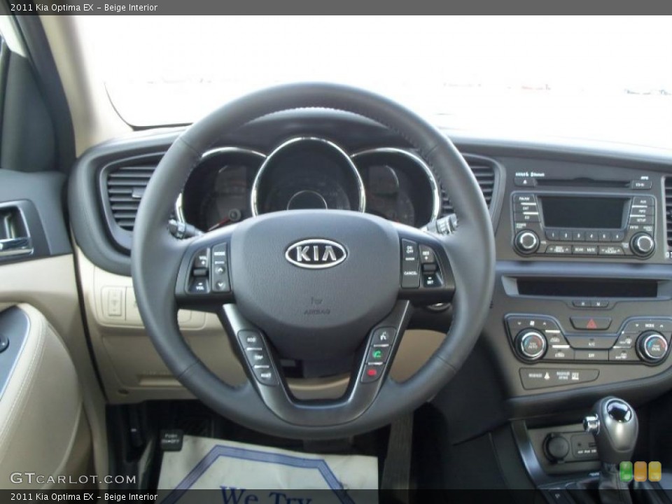 Beige Interior Dashboard for the 2011 Kia Optima EX #41043197