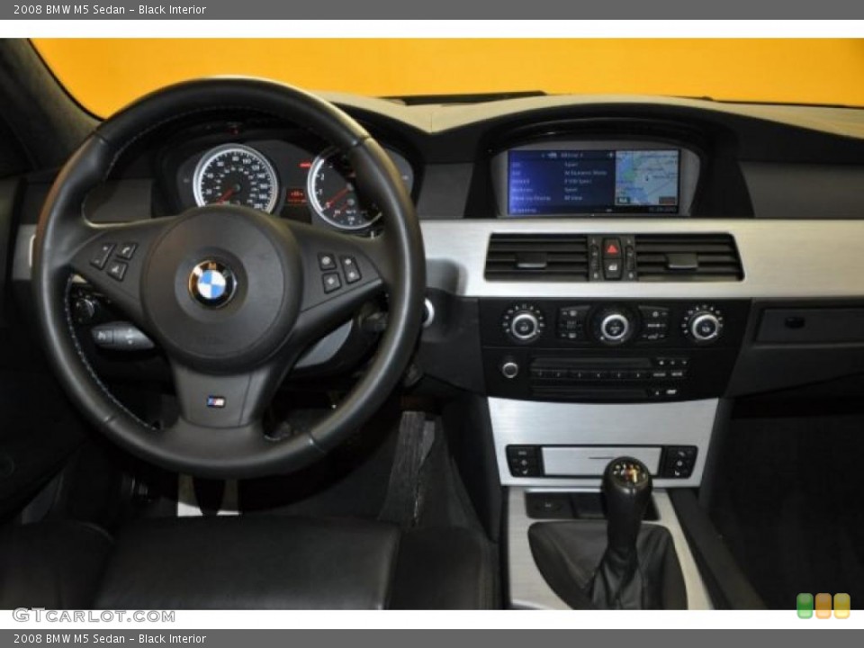 Black Interior Dashboard for the 2008 BMW M5 Sedan #41053785