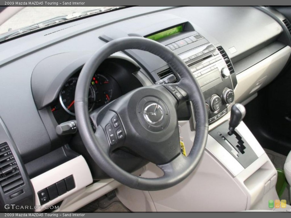 Sand Interior Dashboard for the 2009 Mazda MAZDA5 Touring #41061619