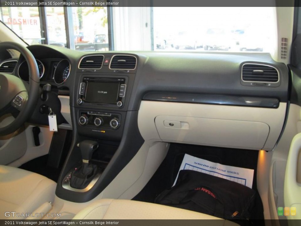 Cornsilk Beige Interior Dashboard for the 2011 Volkswagen Jetta SE SportWagen #41075783