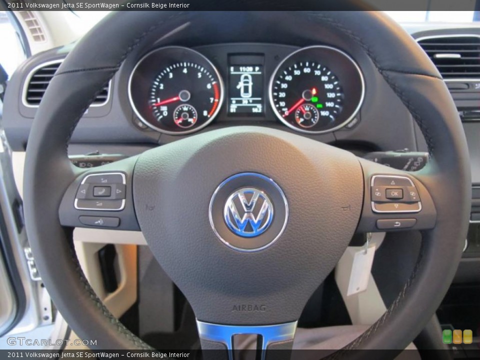 Cornsilk Beige Interior Steering Wheel for the 2011 Volkswagen Jetta SE SportWagen #41075867