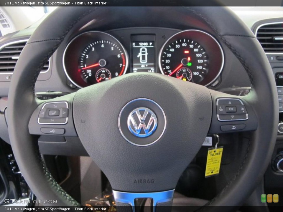Titan Black Interior Steering Wheel for the 2011 Volkswagen Jetta SE SportWagen #41076867