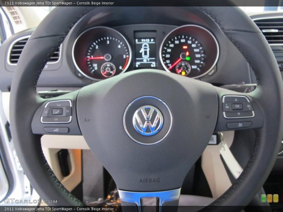 Cornsilk Beige Interior Steering Wheel for the 2011 Volkswagen Jetta TDI SportWagen #41077183