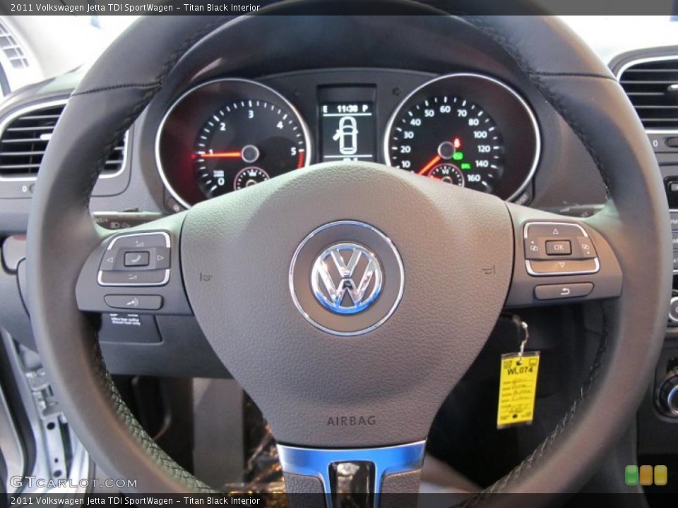 Titan Black Interior Steering Wheel for the 2011 Volkswagen Jetta TDI SportWagen #41077723