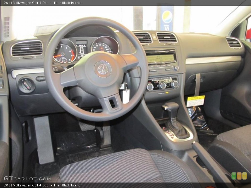 Titan Black Interior Dashboard for the 2011 Volkswagen Golf 4 Door #41077959