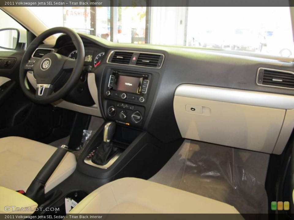 Titan Black Interior Dashboard for the 2011 Volkswagen Jetta SEL Sedan #41079015