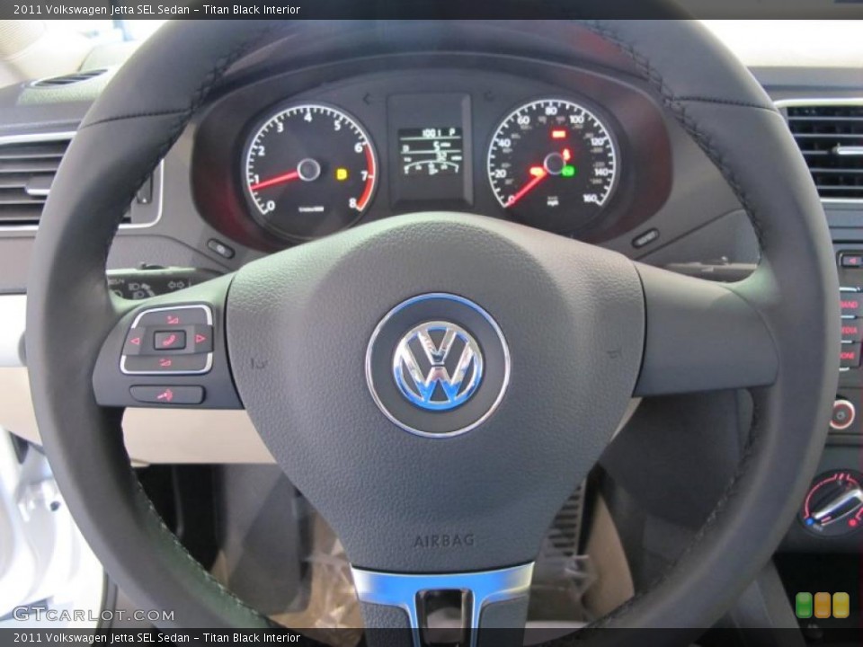 Titan Black Interior Steering Wheel for the 2011 Volkswagen Jetta SEL Sedan #41079107