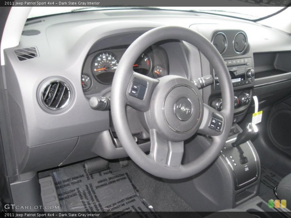 Dark Slate Gray Interior Dashboard for the 2011 Jeep Patriot Sport 4x4 #41079423