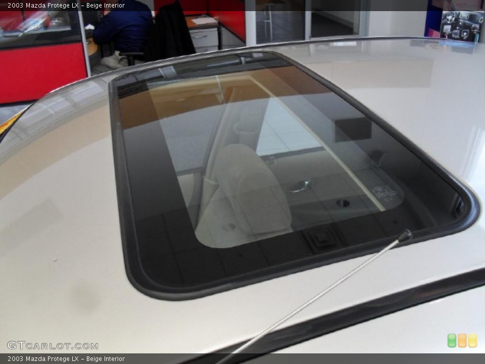 Beige Interior Sunroof for the 2003 Mazda Protege LX #41084199